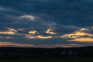 Landscape with sunset. Beautiful view of the bright colorful sky at sunset in the summer evening. as a background