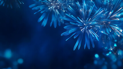 Fototapeta premium Blue fireworks on a dark blue background