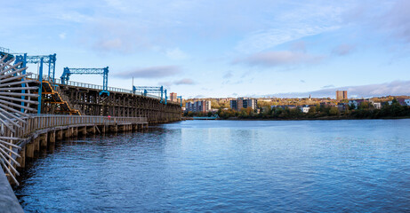 Obraz premium Gateshead UK: 29th Oct 2024: Dunston Staiths on the River Tyne on a sunny autumn day panorama