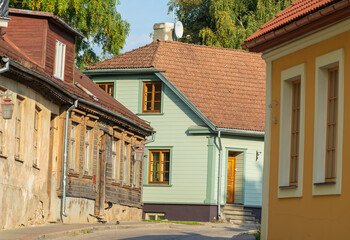 Street with old wooden house Cesis,Latvia.