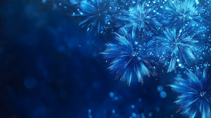 Blue fireworks on a dark blue background