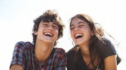 Fototapeta premium Cheerful Teenage Friends Laughing Together in Bright Outdoors