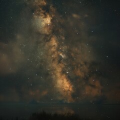 Obraz premium Vast Night Sky Illuminated by Stars and the Milky Way Galaxy Over a Dark Landscape