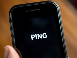The Ping is In: Smartphone screen displaying "PING", a concept for internet connection, network, communication, technology, digital, online, signal, notification, alert, connectivity, mobile, device.