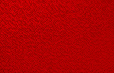 Red pebbled leather pattern as texture or background