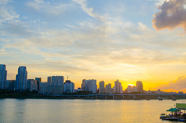 Fototapeta premium Beautiful , luxury soft gradient orange gold clouds and sunlight on the blue sky perfect for the background, take in everning,Twilight, Large size, high definition landscape photo