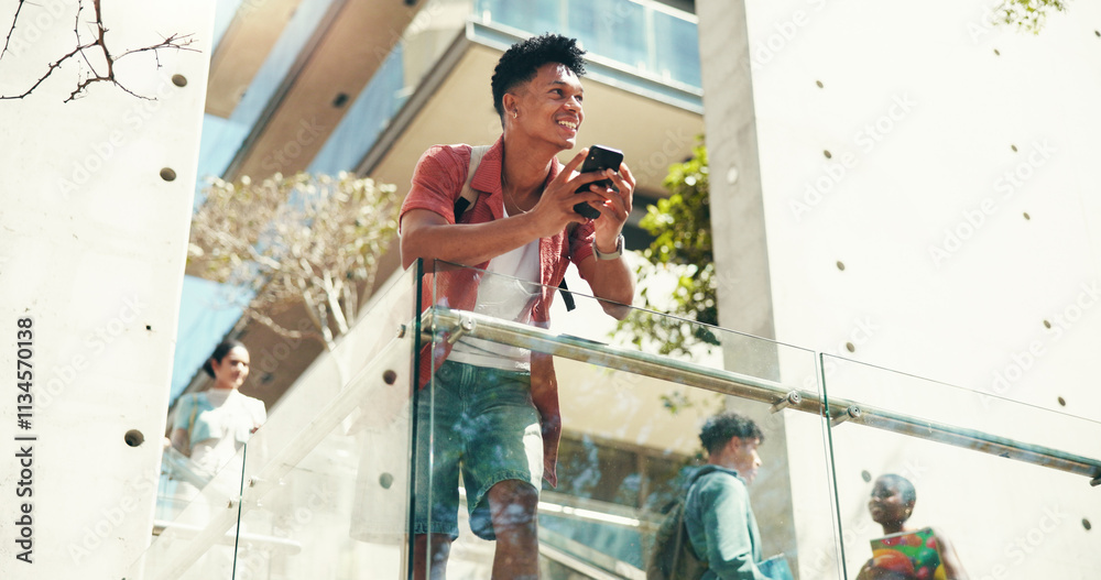 Aufkleber Man, student and phone on stairs at college, smile and thinking with class schedule with low angle. Person, smartphone and happy with mobile app on steps, texting and social network at university
