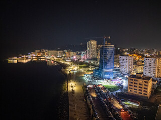 Obraz premium Aerial drone view of the coastal town of Durres in Albania by night.