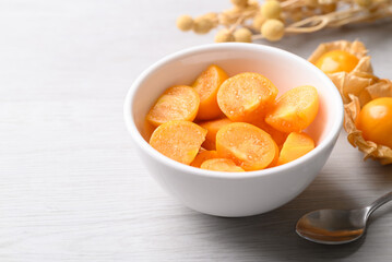 Fresh Cape gooseberry or Golden berry (Physalis peruviana) in bowl ready to eating, Healthy fruit