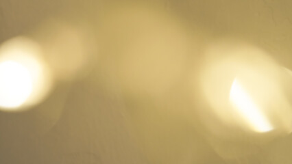 Glowing golden bokeh in an abstract background with a smooth, warm glow