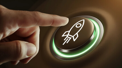 Finger pressing a rocket launch button with green LED light