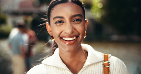 Portrait, excited and education for woman, college and student with scholarship, confident and outdoor. Campus, proud and Indian person with knowledge, university and happy for opportunity in Mumbai