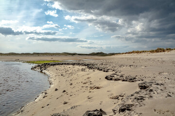 The stream that flows from Sheskinmore Nature Reserve to Ballinravey Strand between Ardara and Portnoo in Donegal - Ireland