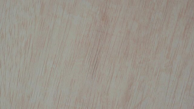 Rotating plywood texture surface background. Scratched wooden board backdrop