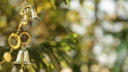 christmas tree decorations background, Forty Wings Christmas Pine Fruit and hanging from above, sparkling ornaments garland close up shot on blurred festive background. selective focus with blur

