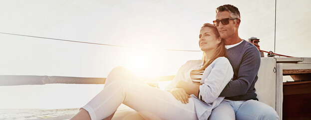 Hug, romance and holiday with mature couple on yacht together with celebration, anniversary and luxury cruise. Summer, banner and love with man and woman on sailboat for vacation, travel or trip