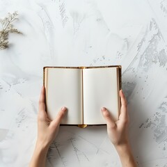 Open Book with Blank Pages Held by Hands on White Background