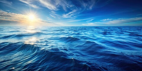 Obraz premium A mesmerizing vista of the deep blue ocean, with a gentle breeze ruffling the surface and a radiant sun casting a golden glow across the water