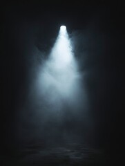 Fototapeta premium Single Spotlight Illuminates Smoky Dark Room
