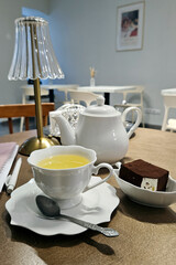 Green tea in a white cup sweet dessert