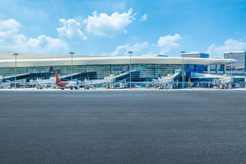 Empty road and terminal building in airport