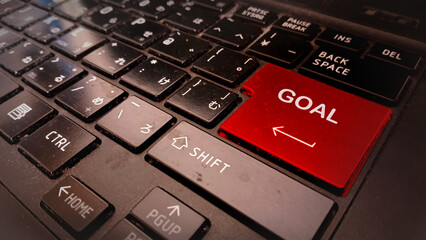 self improvement word goal write on entering keyboard text with red focus 