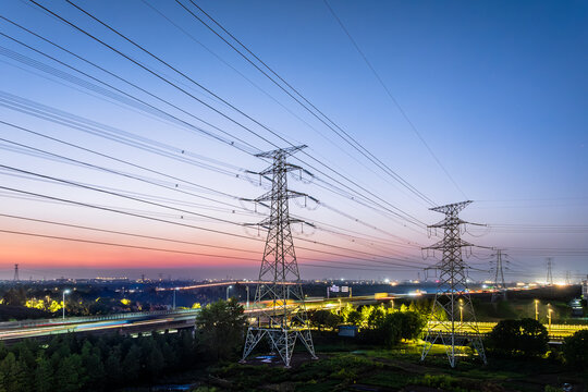 High voltage electric tower and natural scenery at dusk