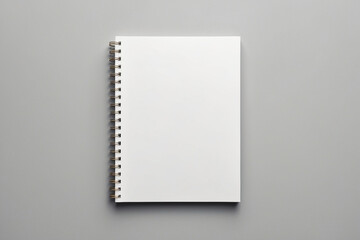 Blank realistic spiral bound notepad mockup on light grey background.