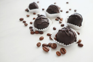 Tasty chocolate bonbon sweets on table