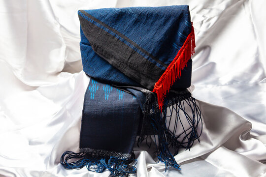 Bulang-bulang as a head decoration for men and Ulos cloth from the Pakpak Batak tribe