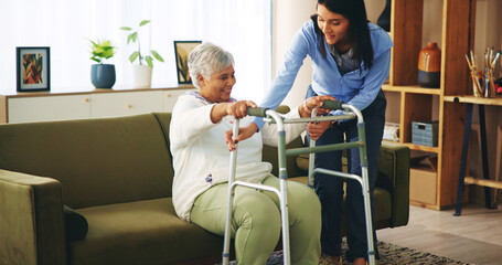 Elderly woman, walker and caregiver in home for help, assisted living and rehabilitation. Senior...