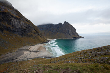Autumn colours at Kvalvika Beach on the Lofoten Islands from above, Norway.