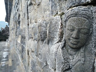 Portrait of stone carving in borobudur temple