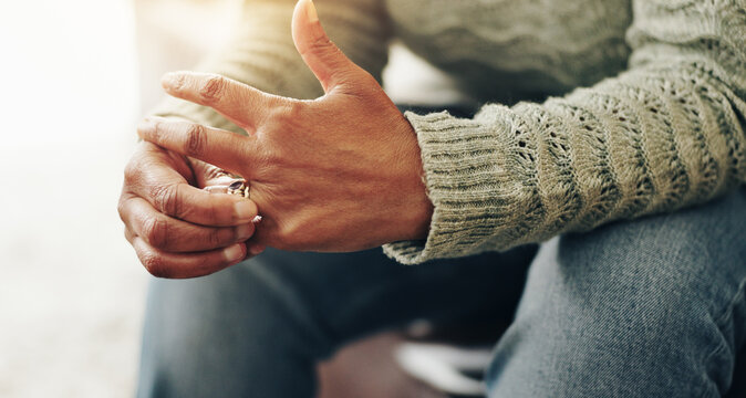 Hands, crisis and divorce with wedding ring as stress, anxiety and mistake in relationship or worry. Person, conflict and frustrated in thinking for depression, tension and mental health in therapy