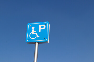 parking sign on sky. Parking for the disabled.