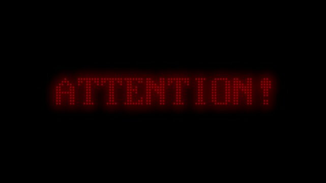 rote leuchtende Anzeige zeigt die Meldung: Attention!