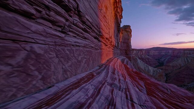 Sunset over breathtaking rock formations in desert landscape