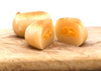 Pastel de yema, candied yolk covered in marzipan, one of many Spanish sweets typically associated with Christmas
