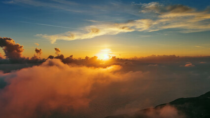 Aerial view of bright sunset clouds