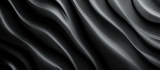 Fototapeta premium Abstract grayscale flowing fabric texture.