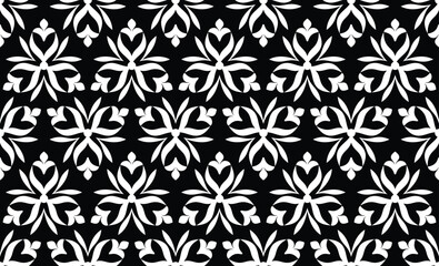 Wallpaper in Baroque style, damask. A seamless vector background. Black and white texture Floral ornament.