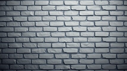 Fototapeta premium A textured brick wall in a cool gray color scheme with subtle variations in the bricks' shape and texture.