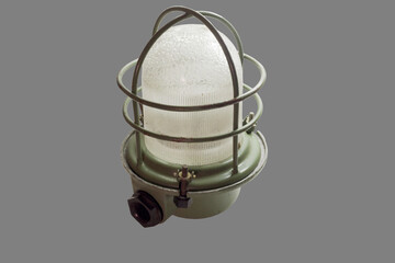 vintage bunker lamp, caged hanging lighting fixture, explosion proof domed thick ribber glass lamp cover, moisture proof power cable wiring black bushing. isolated