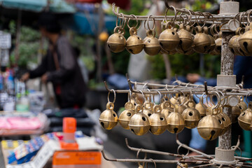Obraz premium Small bells for sale at traditional market, Selective focus