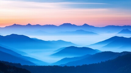 Fototapeta premium Mountain mist and fog, mysterious view of mountains shrouded in dense mist and fog rolling through valleys