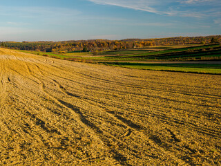 An autumn agricultural landscape. Roztocze. Lublin Voivodeship. Poland. The image depicts a picturesque autumn agricultural landscape. 