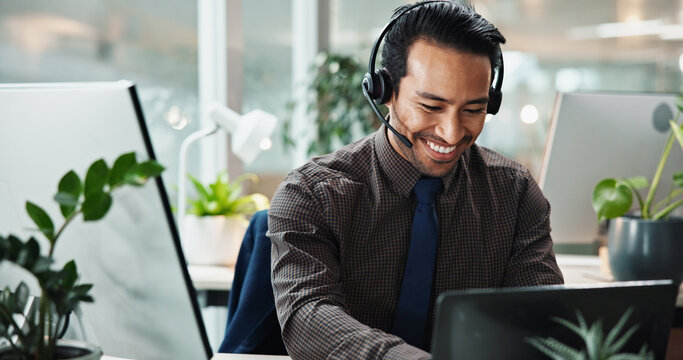 Happy Asian man, call center or laptop in office for contact us at law firm with mic, smile or justice advice. Legal consultant, typing or customer support for dispute resolution service at help desk