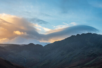 Obraz premium Beautiful Autumn sunrise landscape image of Buttermere in Lake District with Fleetwith Pike and Haystacks mountains