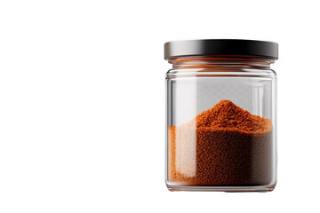 a glass jar with orange powder in it