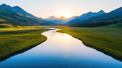 Naklejka premium A serene landscape featuring a winding river surrounded by lush green meadows and majestic mountains, illuminated by the warm glow of sunrise.